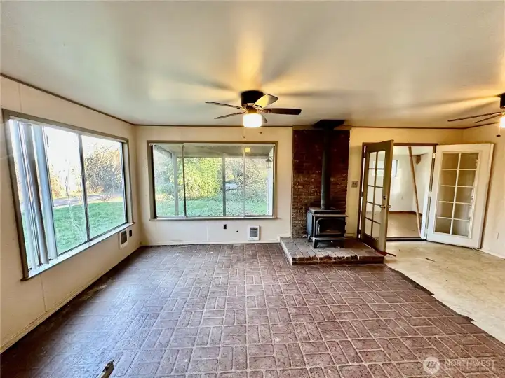 Looking toward the extra front entry with French doors to living room.