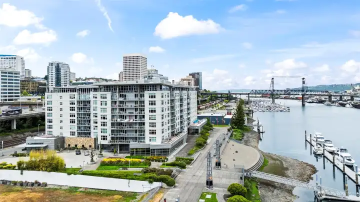The Esplanade condominium building sits along the Thea Foss Waterway with access to paths and nearby amenities