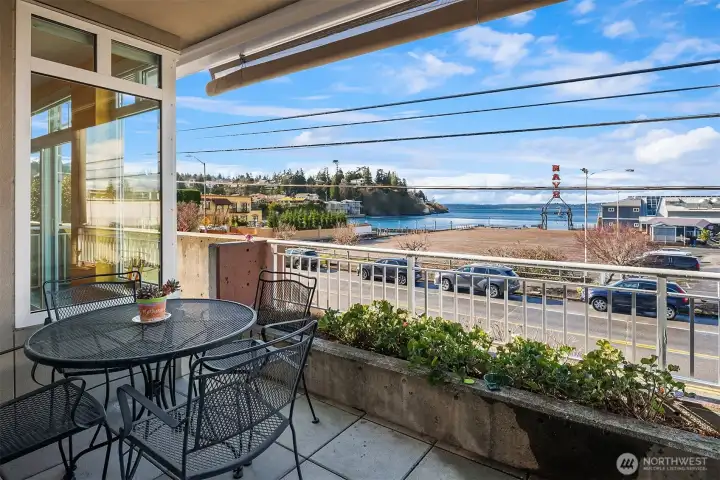 Beautiful, private, fully covered deck off of the living room with amazing views of the the entry to the ship canal, the Sound, and the Olympic mountains