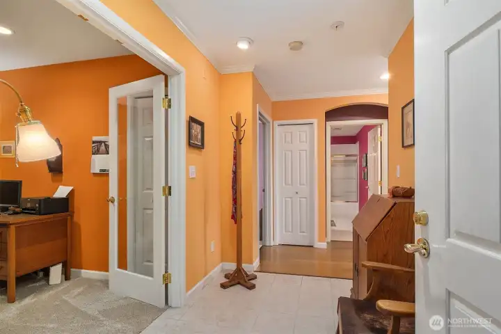 Condo entry with the den/office on the left