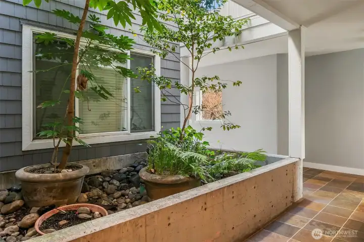 Open air vestibule leading to the condo