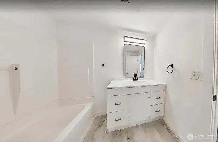 Large, full bathrooms recently remodeled