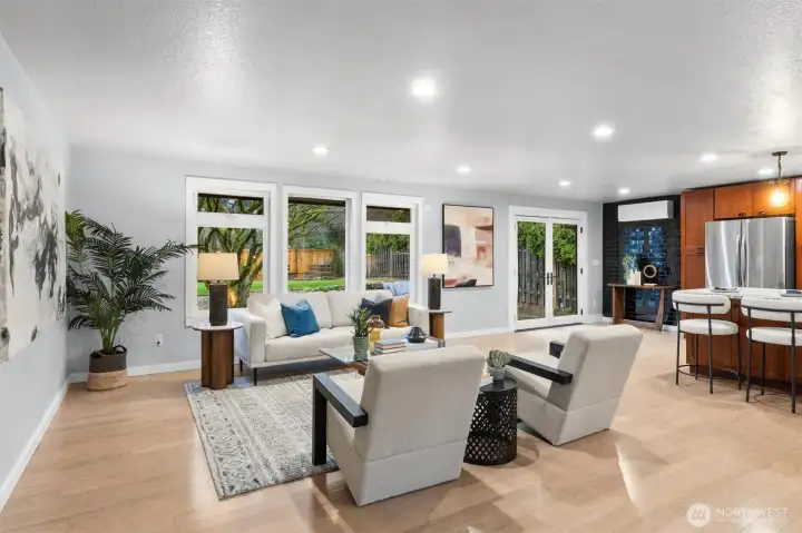 Enter into the open concept dining and living area