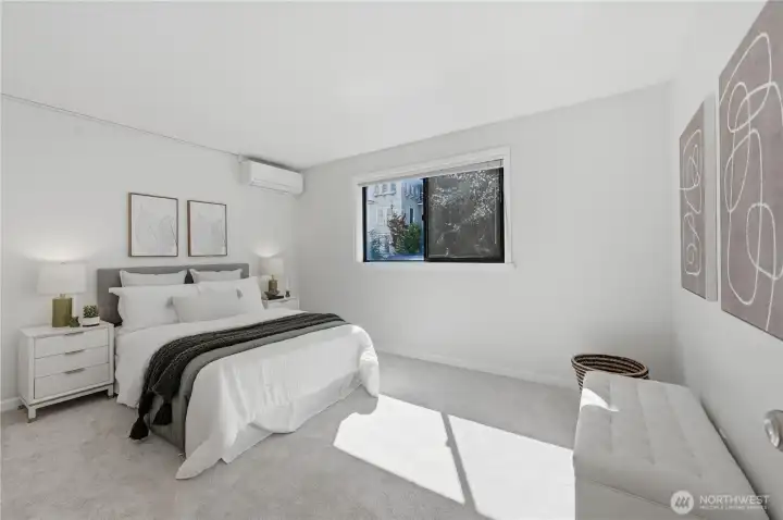 Lovely guest bedroom with custom closet organizer.