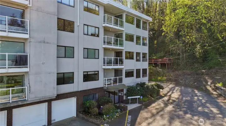 Alii Kai Condominium, a 16-unit boutique building with secure lobby, parking, storage & bike room across from the beach for unobstructed 24/7 views!