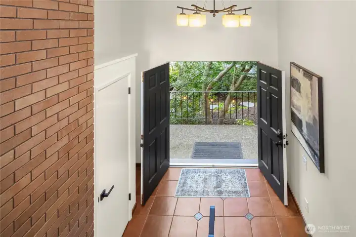 French doors & large entry to greet your guests.