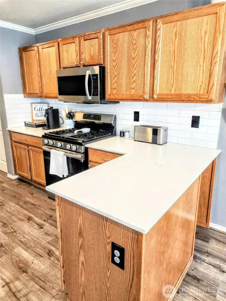 Detail view of the white quartz countertops.