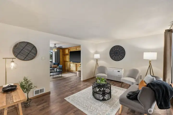 First of two living spaces giving you room and space for cherished lakeside gatherings. First of two living spaces giving you room and space for cherished lakeside gatherings.