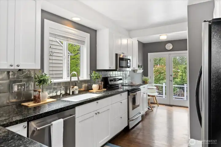 French doors off kitchen to back deck