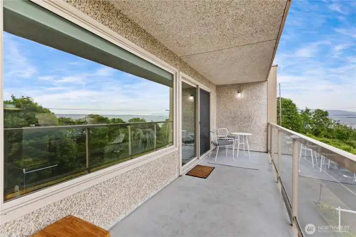 Large balcony for entertaining, container gardening or people watching. Large balcony for entertaining, container gardening or people watching.