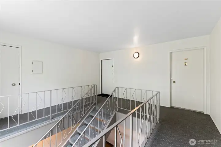 Landing by front door with level access from the back of the building Landing by front door with level access from the back of the building