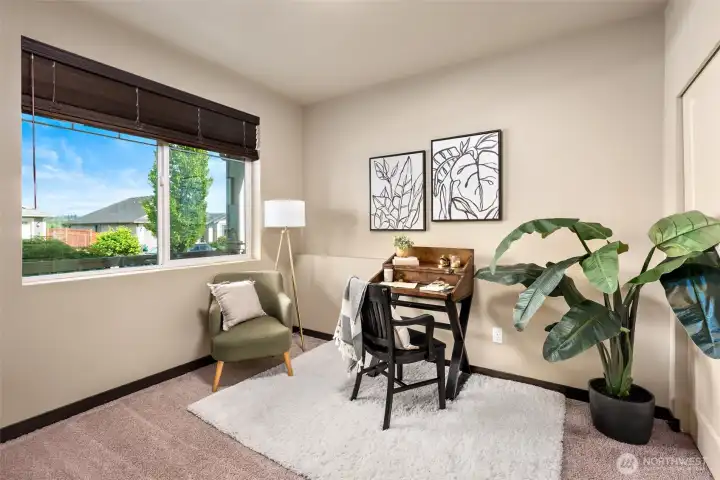 Downstairs bedroom allows for perfect office or guest room.