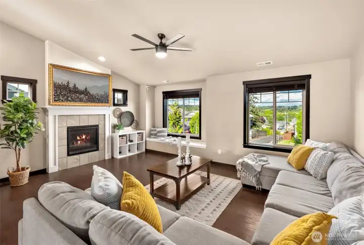 Vaulted ceilings in the living room allow for large amounts of light to enter the home.