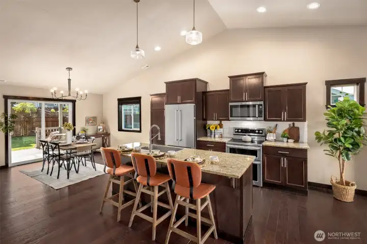 Living room and dining room flow seamlessly together.