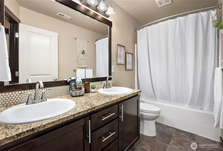 Another full bathroom upstairs for other bedrooms.