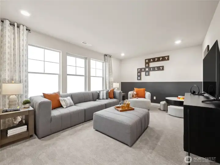 Spacious bonus room/bedroom. Photo is representational. Actual home is under construction and finishes and paint colors may vary. See site agent for details.... Spacious bonus room/bedroom. Photo is representational. Actual home is under construction and finishes and paint colors may vary. See site agent for details....