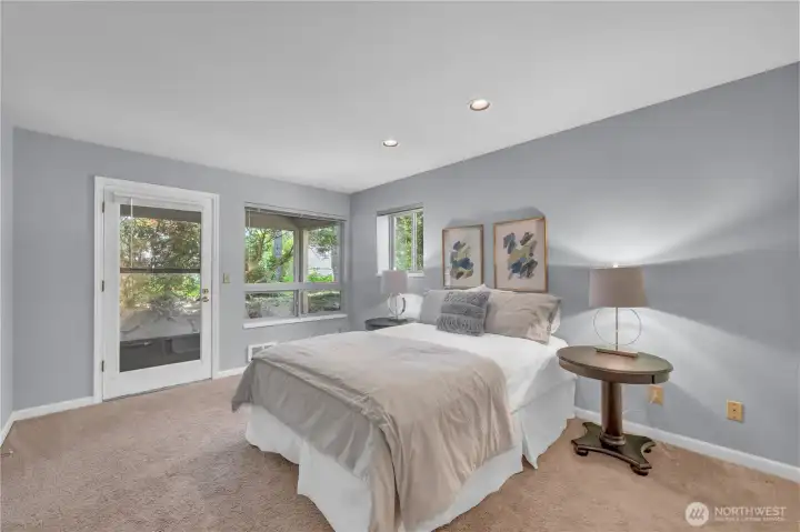 Primary bedroom with access to the patio, walk in closet and bathroom Primary bedroom with access to the patio, walk in closet and bathroom