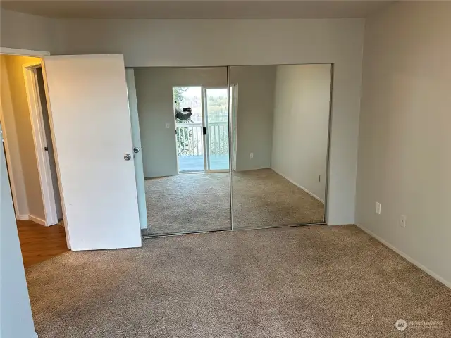 Large mirrored closet in the primary bedroom