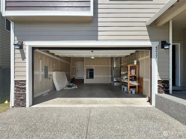 Large 2 car garage with Level 2 Electric Car Charger installed