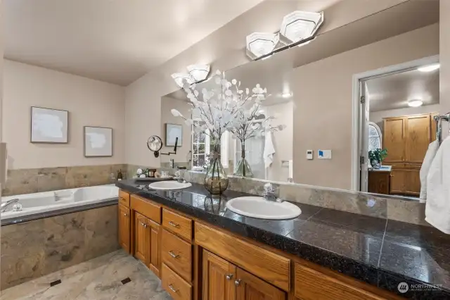 Dual sink vanity with large soaking tub and walk-in shower