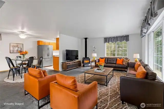 Virtually staged upper family room.