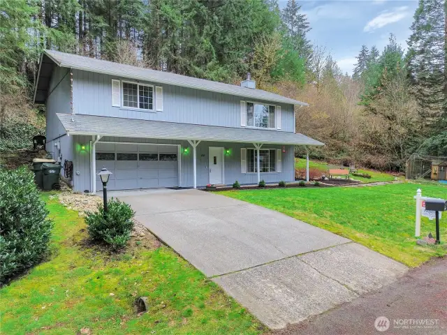 Handsome home in wooded, convenient location.