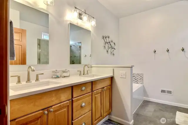 Dual vanities in your updated primary suite. Stunning finishes and attention to detail