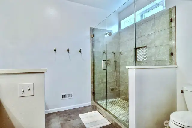 Beautiful shower with modern tile updates.