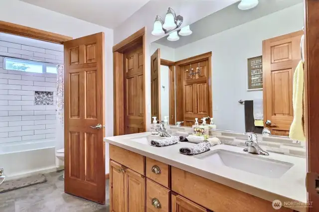 You’ll love the details in this updated jack-n-Jill bathroom. This serves both the second and third bedrooms upstairs.