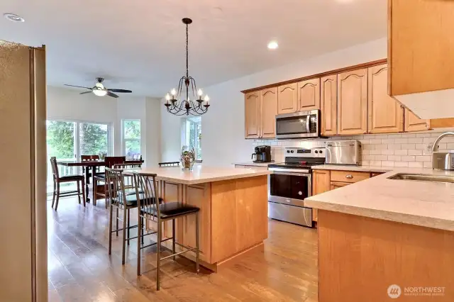 This kitchen has a spacious island, stainless appliances, beautiful counter tops and the lake views will make sure you’re not missing out on anything.