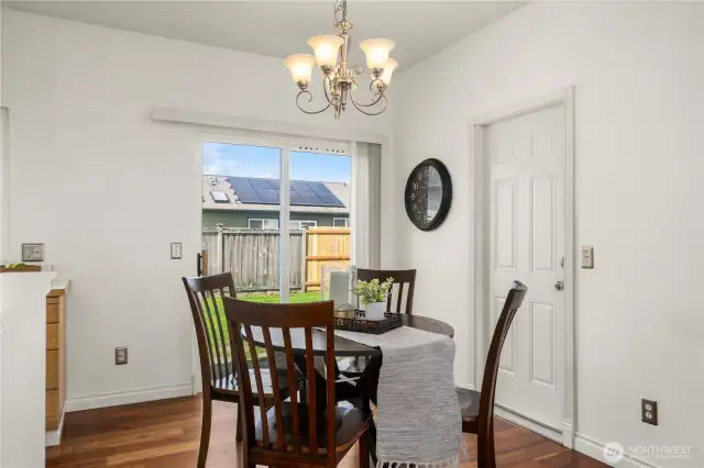 Dining area situated between the living and kitchen