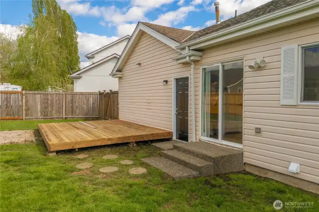 From the dining room sliders, step out back to find a large backyard!