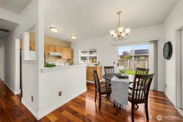 Dining flows into the charming kitchen