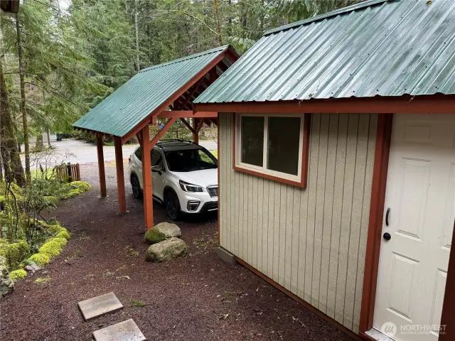 Covered parking and work shed