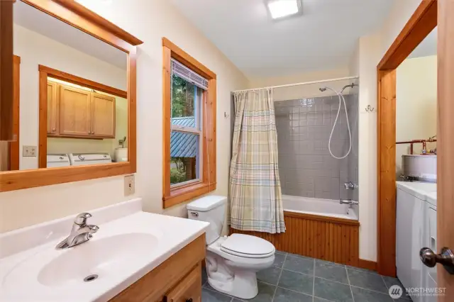 Main floor bath with washer and dryer