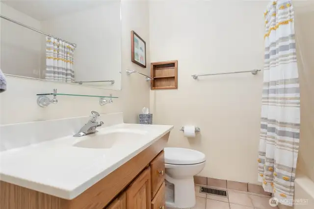 Full bath near guest bedrooms.
