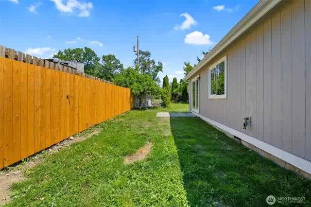Backyard of Unit B. There is also a generous-sized side yard!