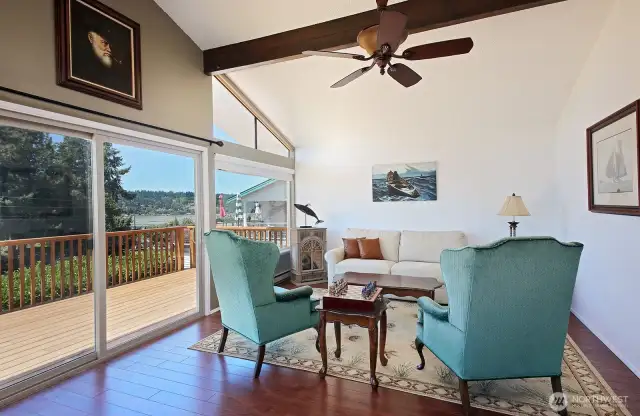 Vaulted ceiling adds to the light and openness of your main living area. In the distance you can see that your view extends into Cultus Bay.