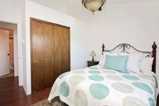 Standard sized closet in the bedroom. Across the hall is your full bath. There is also a half bath in the garage (not photographed). Your washer and dryer are also in the garage.