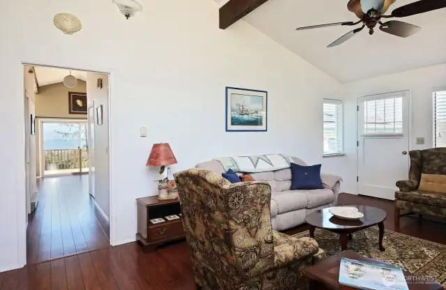 You are now in the Family Room. You even have a view from here! The door (right edge of photo) leads to the outside. The door to the garage is just beyond the left edge of this photo.