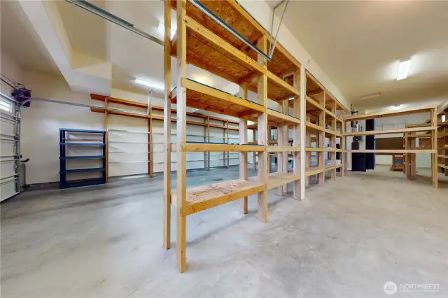 Tandem 6-car garage - extra-wide 3rd bay is 10'x8', perfect for storing your boat between outings on nearby Lake Tapps! Workshop is behind the 3rd bay