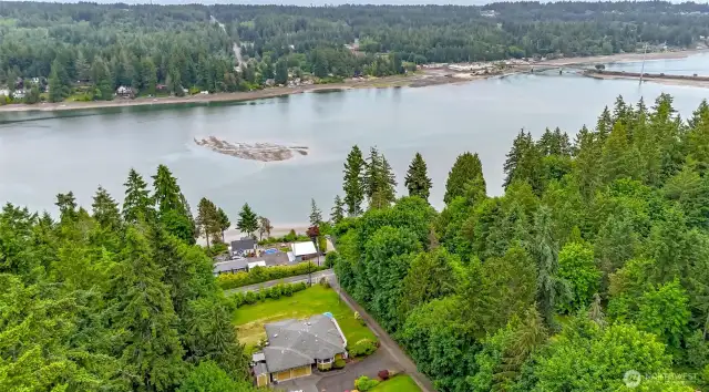 Stunning view and the property is nestled amidst lush evergreen trees, offering a tranquil and private setting.