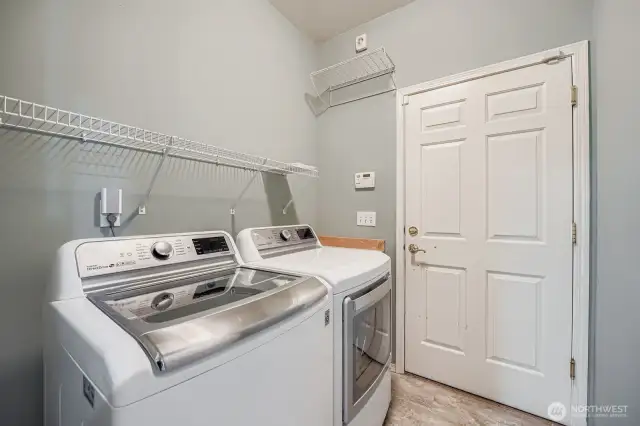Main floor laundry room/Entry way to garage