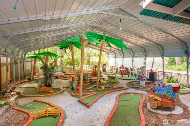 And then there is the putt putt golf, lot of thought and detail. Structure (#2) measures approximately 28' X 31' and if golf not your game would make a great shop or covered storage facility.