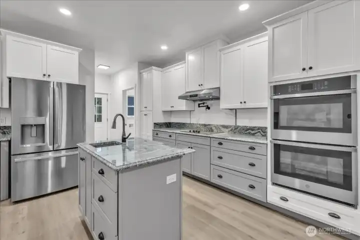 Light filled kitchen. with double oven.