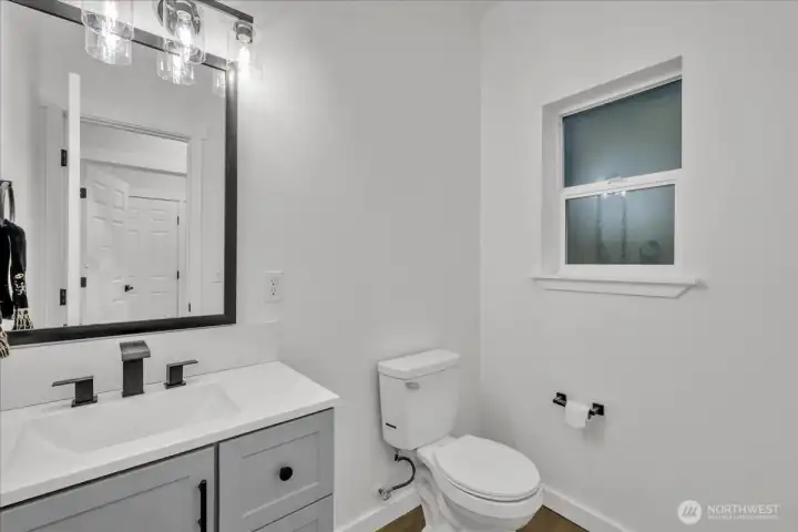 1/2 bath off laundry room.