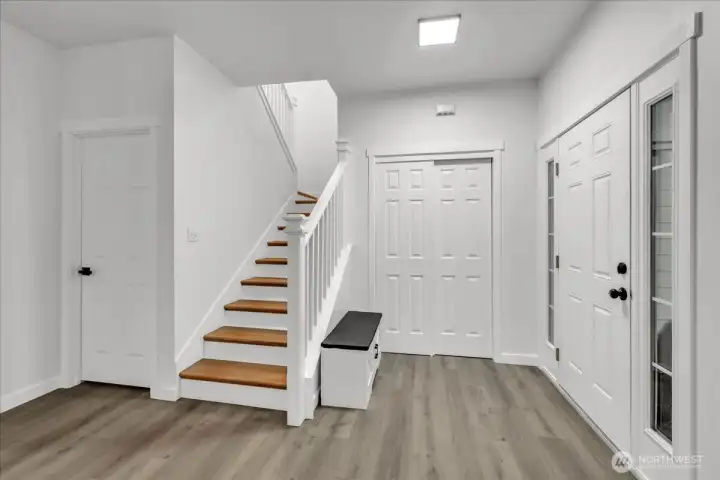 Stairs leading to bedrooms.  Extra large storage closet under the stairs!