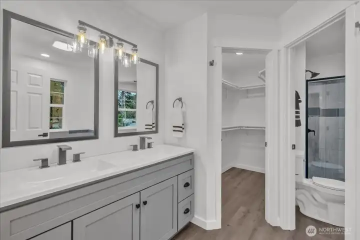 Primary en suite bath with double sinks.