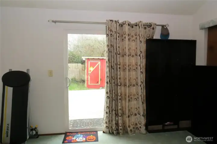 PRIMARY BEDROOM HAS SLIDING DOORS TO THE OUTSIDE DECK WHERE YOU CAN ENJOY BARBEQUES AND THE OUTDOORS!