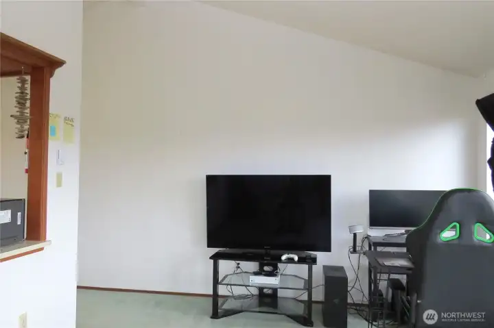 THIS COULD BE A DINING AREA OR CONTINUED LIVING ROOM!